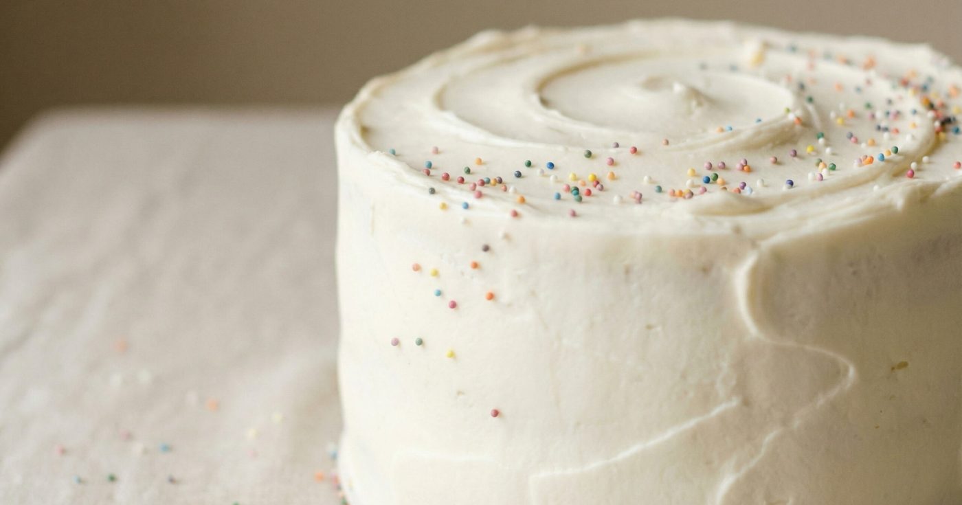 White cake with rainbow sprinkles representing embedded Professional Responsibility issues on the Florida Bar Exam.